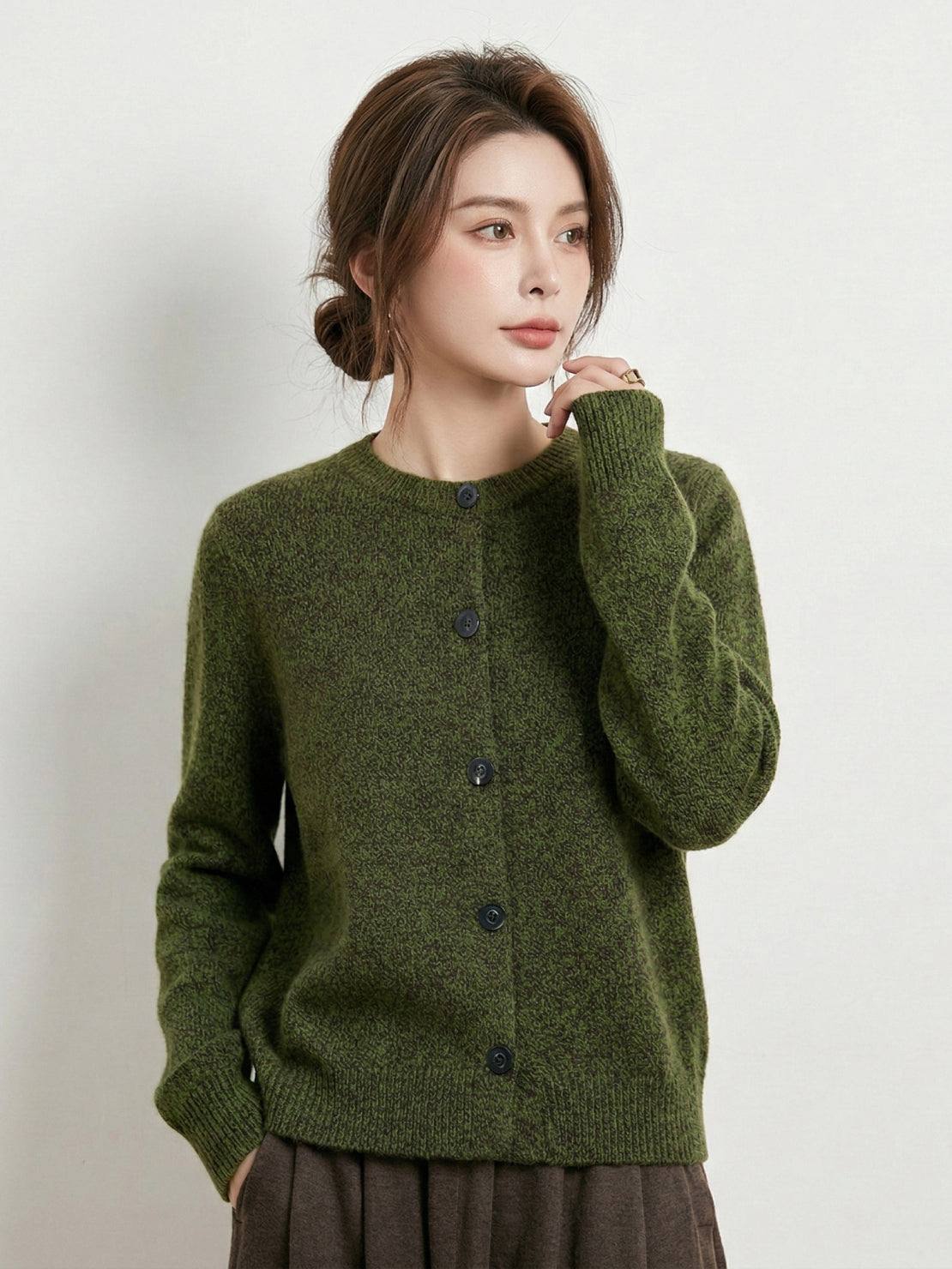 Marled knit merino wool cardigan with chunky texture and dark buttons