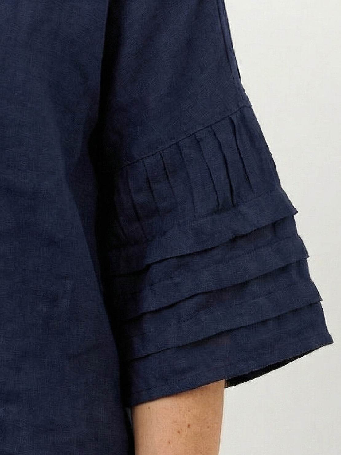 100% cotton two-piece wrap skirt and hip-length top set with crinkle texture and elastic waistband