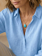 100% cotton popover blouse with relaxed fit and classic collar