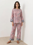 100% cotton Chinese Pankou pajamas set with tunic top and wide-leg pants featuring frog knot closures and contrast piping