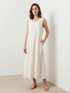 Lightweight cotton linen sleeveless maxi dress with round neckline and flowing ankle-length silhouette