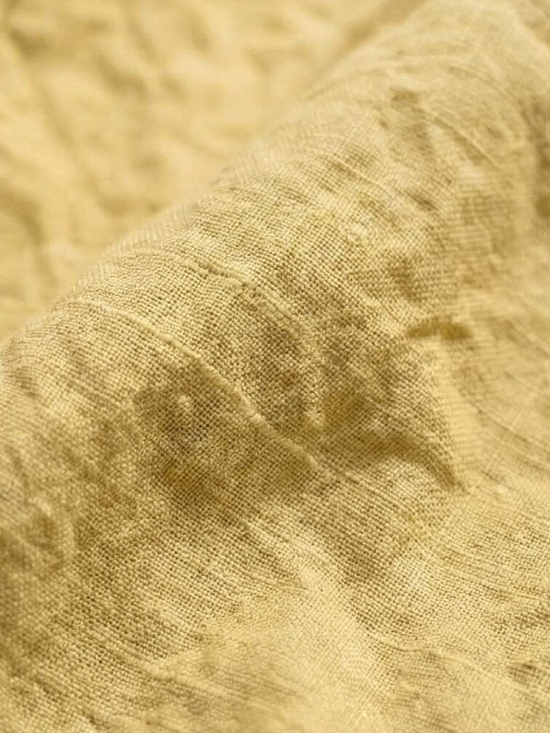 100% linen harem balloon pants with elastic drawstring waistband and side pockets in natural crinkle texture