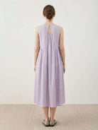 Sleeveless cotton linen pleated midi dress with pintuck bodice and full A-line calf-length skirt