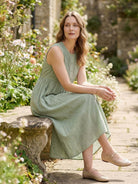 Women’s sleeveless cotton linen pleated midi dress with pintuck bodice and empire waist A-line skirt