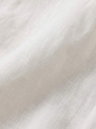 100% linen sheer overshirt with relaxed fit, semi-transparent fabric, classic collar, and button front