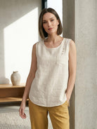 Lightweight 100% cotton linen sleeveless top with curved hem and chest pocket detail