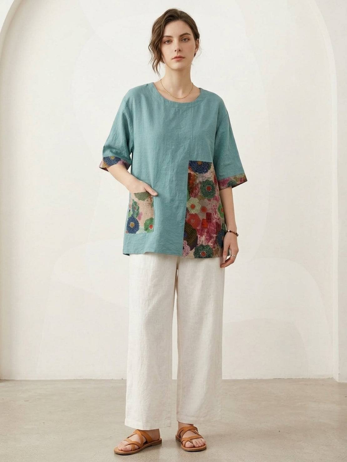 Oversized cotton linen floral shirt with elbow-length sleeves and botanical panel