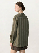 Linen-cotton striped shirt with tassel trim and relaxed fit