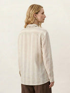 Linen-cotton shirt with vertical stripes, tassel trim, and relaxed fit