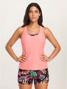 Three-piece tankini set with criss-cross back tank top, printed sports bra, and boy shorts