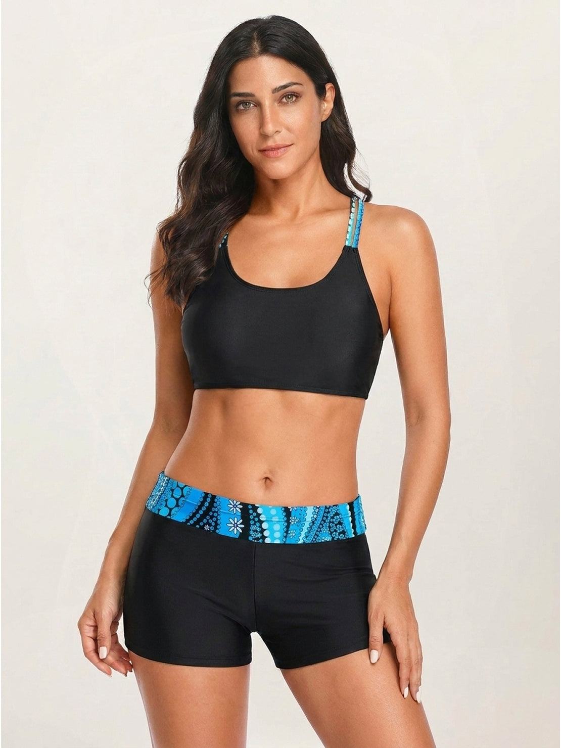 Three-piece criss-cross back tankini set with loose tank, printed sports bra, and boy shorts