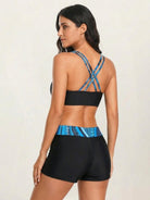 Three-piece criss-cross back tankini set with printed sports bra and boy shorts