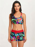 Three-piece tankini set with criss-cross back tank top, printed sports bra, and boy shorts