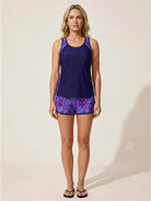 Racerback two-piece tankini set with scoop neckline and tropical print swim shorts with pockets
