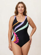 Plus size bold print one-piece swimsuit with scoop neckline, wide straps, high-cut leg, and smooth matte fabric