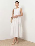 Cotton-linen summer midi dress with tiered skirt and relaxed drop-waist silhouette in lightweight fabric