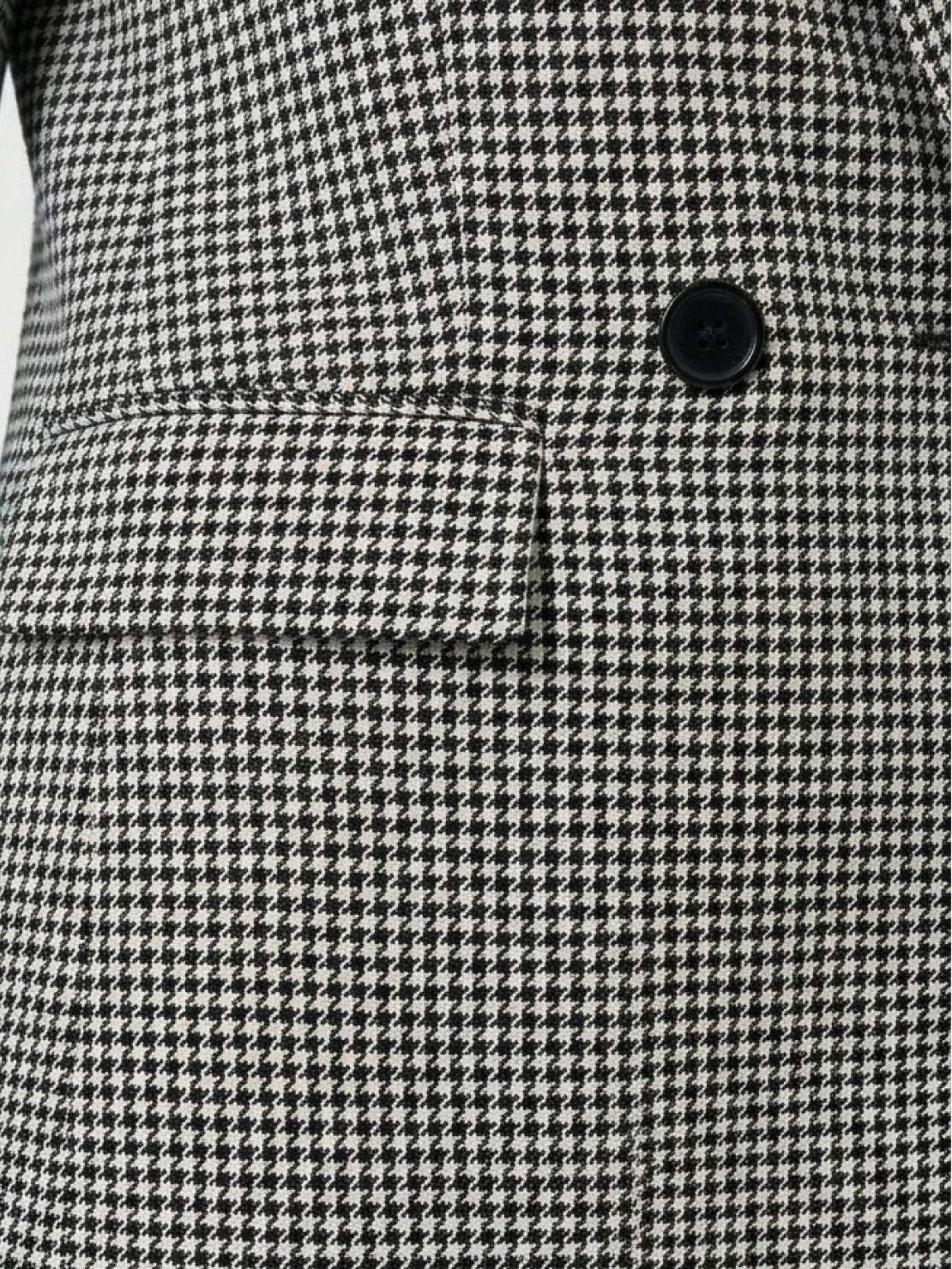 Black and white classic houndstooth commuter blazer with structured shoulders and relaxed fit