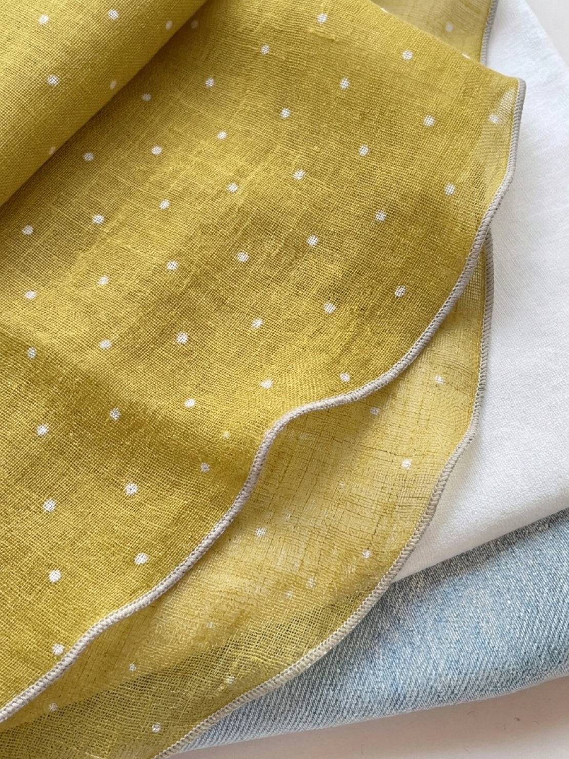 100% linen neck scarf with lightweight breathable fabric and timeless checkered pattern