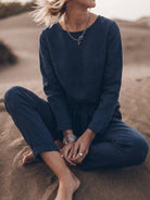 woman wearing cotton-linen monochrome relaxed longline top and wide-leg pants set