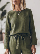 Model wearing cotton-linen monochrome relaxed longline top and wide-leg pants set