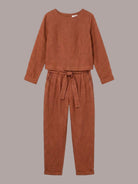 Woman wearing relaxed cotton-linen monochrome longline top and wide-leg pants set