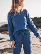 Woman wearing relaxed cotton-linen monochrome longline top and wide-leg pants set