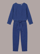Woman wearing relaxed cotton-linen monochrome longline top and wide-leg pants set