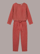 Woman wearing relaxed cotton-linen monochrome longline top and wide-leg pants set