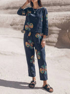 woman wearing cotton-linen monochrome relaxed longline top and wide-leg pants set