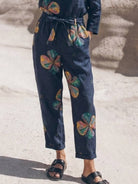 Woman wearing relaxed cotton-linen monochrome longline top and wide-leg pants set