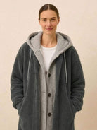 woman wearing gray everyday wear oversized sherpa long coat with cozy lining and relaxed fit