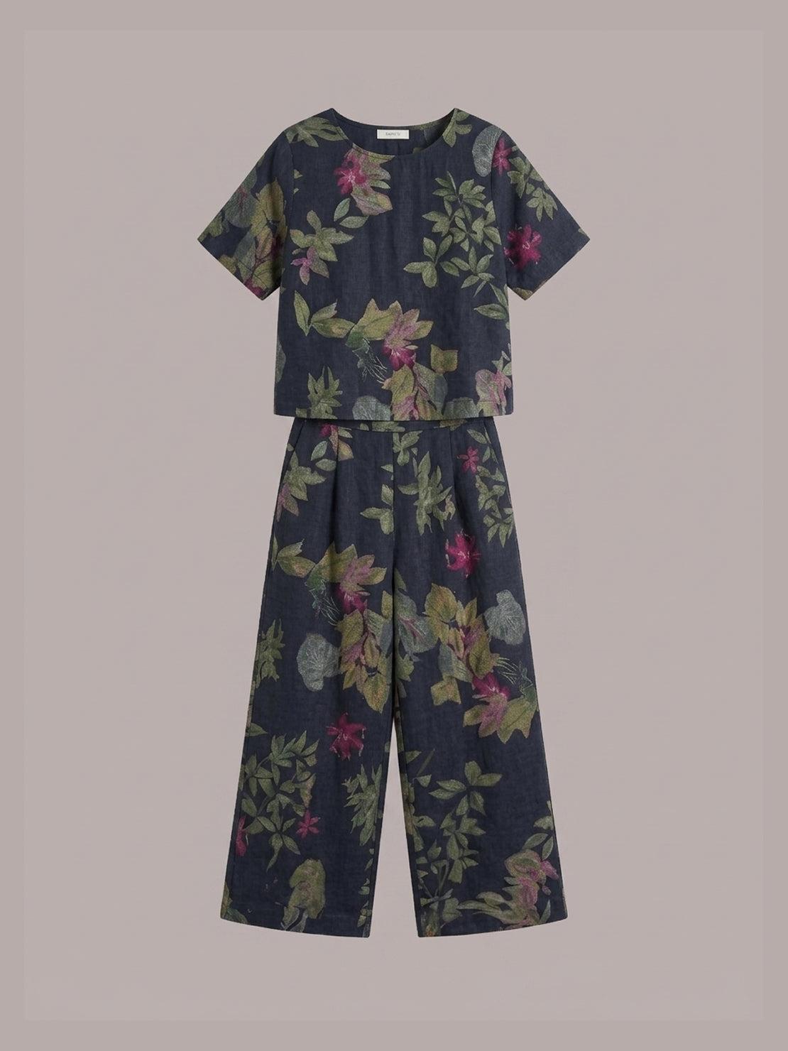 Light beige loose fit co-ord set with soft-tailored top and wide-leg cotton trousers displayed on plain background