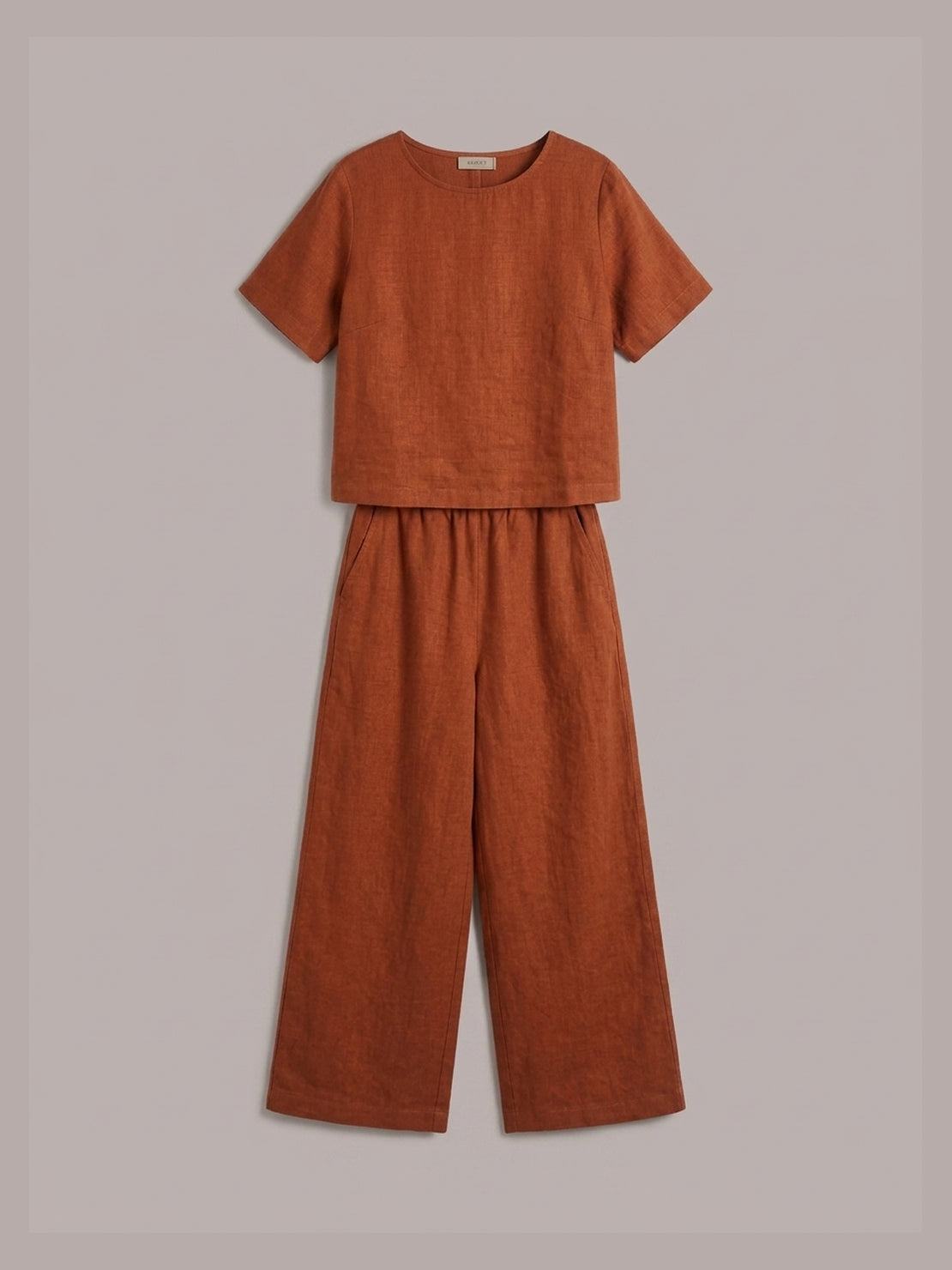 woman wearing soft-tailored loose fit co-ord set with wide-leg cotton trousers