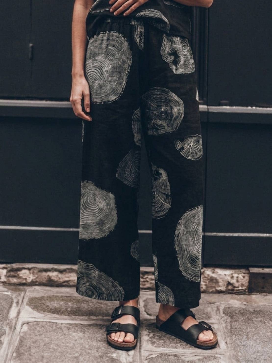Woman wearing soft cotton loose fit co-ord set with relaxed top and wide-leg pants