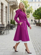 Water-repellent A-line hooded raincoat with belt and insulated lining for women