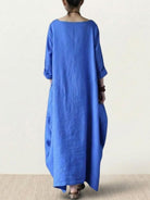 Bohemian maxi dress in oversized linen blend with long sleeves and loose fit.
