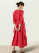 Loose fit Bohemian maxi dress in breathable linen blend with long sleeves and floor-length design