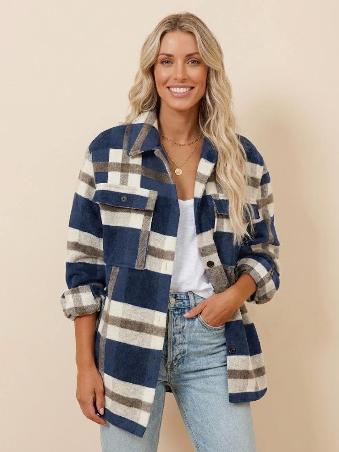 woman wearing comfy flannel classic button-down shirt in blue and white plaid pattern