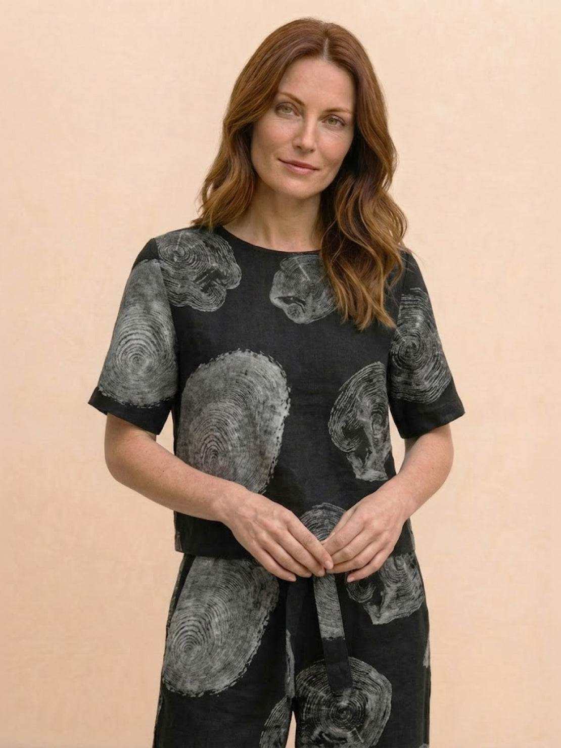 Cotton linen monochrome short-sleeve top with relaxed fit and natural texture