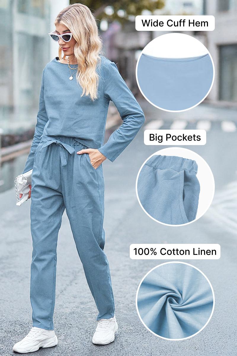 Woman wearing blue cotton-linen monochrome relaxed longline top and wide-leg pants set with wide cuff hem and big pockets