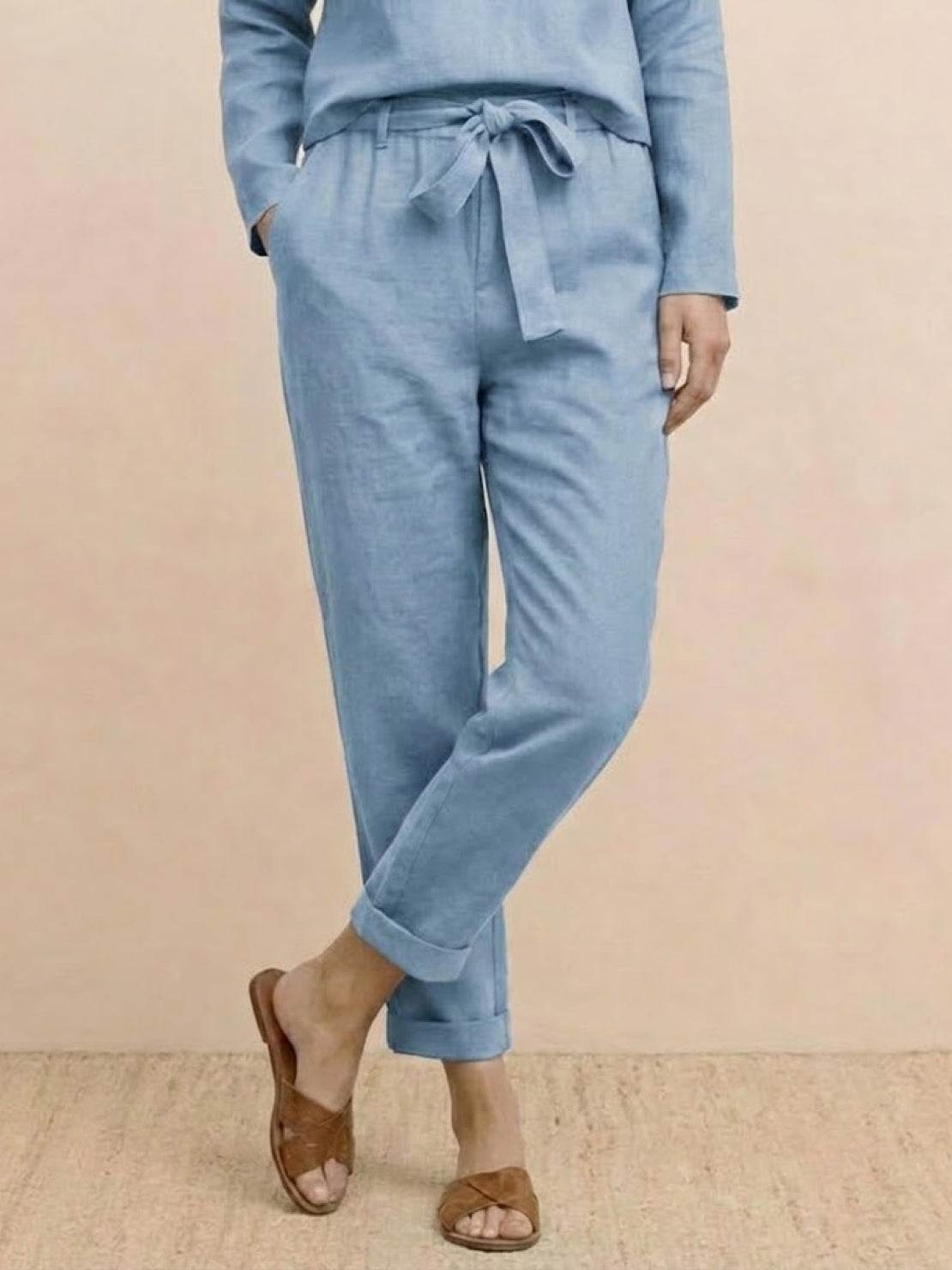 Cotton-linen monochrome capsule set featuring relaxed longline top and wide-leg pants in minimalist design