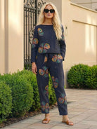 Woman wearing cotton-linen monochrome relaxed longline top and wide-leg pants set