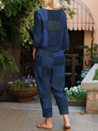 Cotton-linen monochrome capsule set with relaxed longline top and fluid wide-leg pants in minimalist style