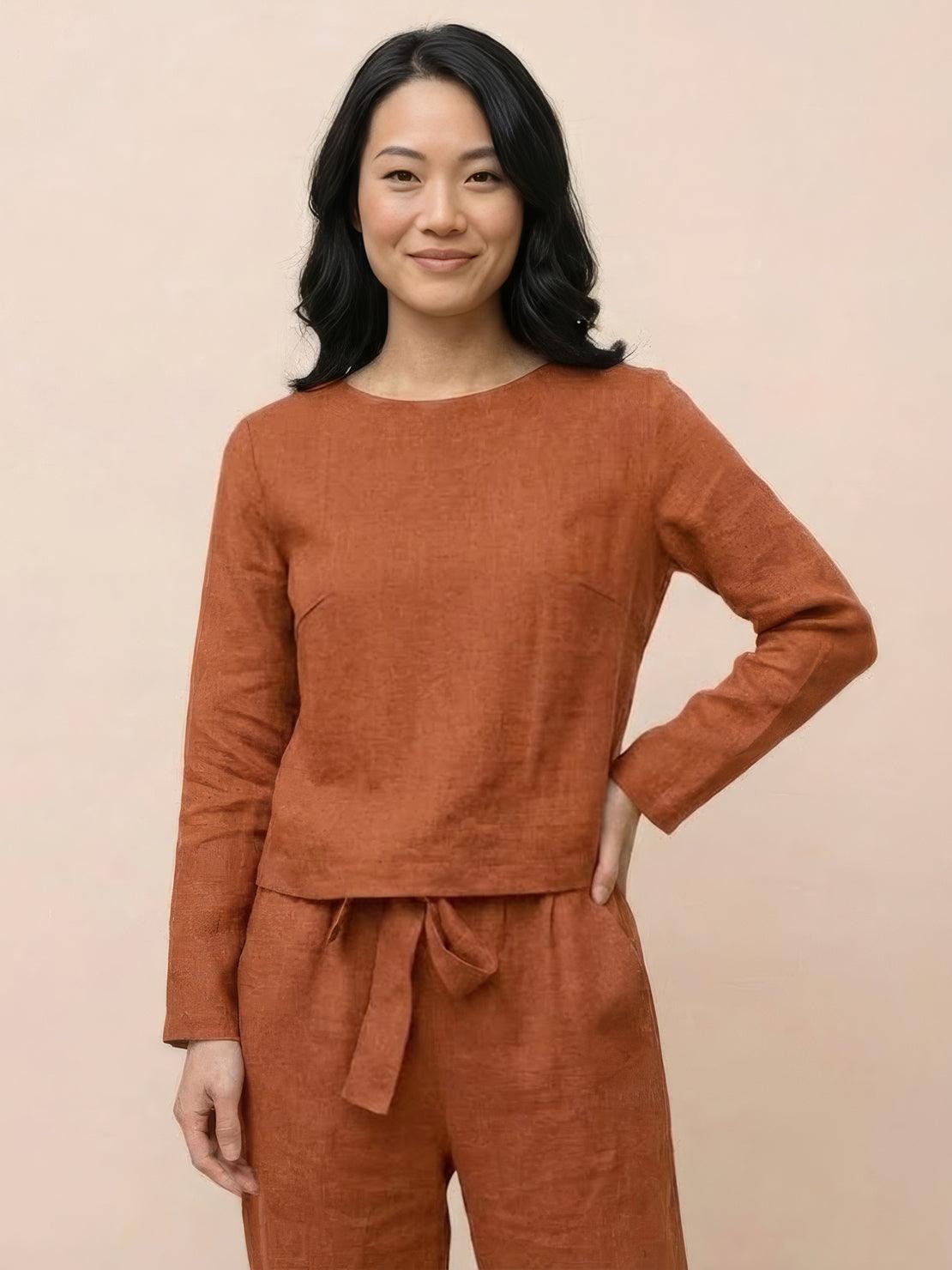 Model wearing cotton-linen monochrome relaxed longline top and wide-leg pants set