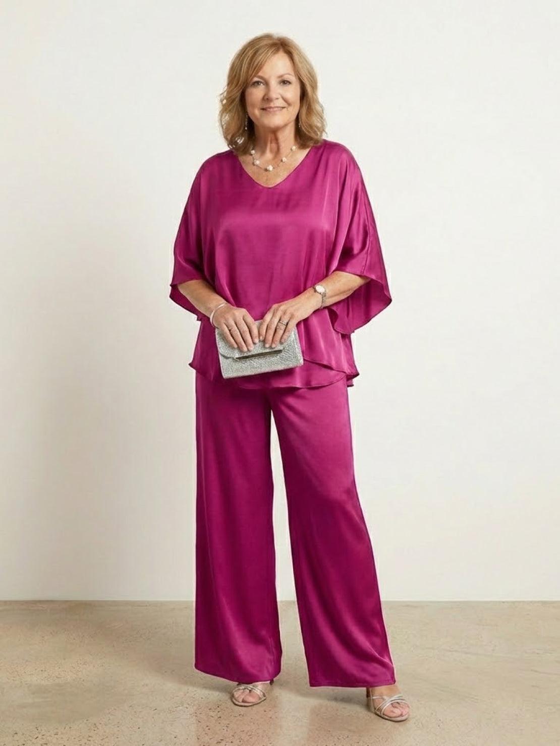 Woman modeling Elegant Layers Two-Piece Set with layered V-neck top and matching pants in soft fabric