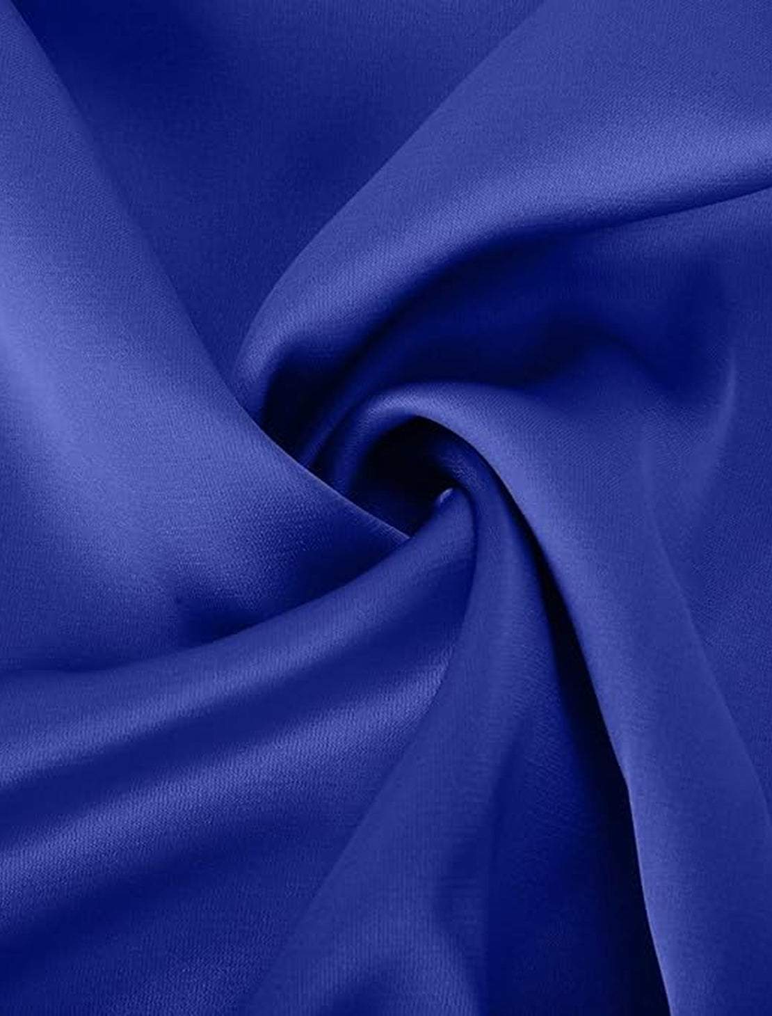 Woman wearing Elegant Layers Two-Piece Set with V-neck layered top and matching pants, styled for versatile comfort and flattering fit