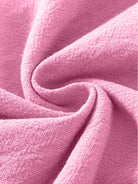Close-up of soft pink cotton linen fabric for high-waist palazzo pants