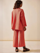 Two-piece oversized set designed for multi-weather comfort with lightweight, wrinkle-resistant fabric and relaxed fit