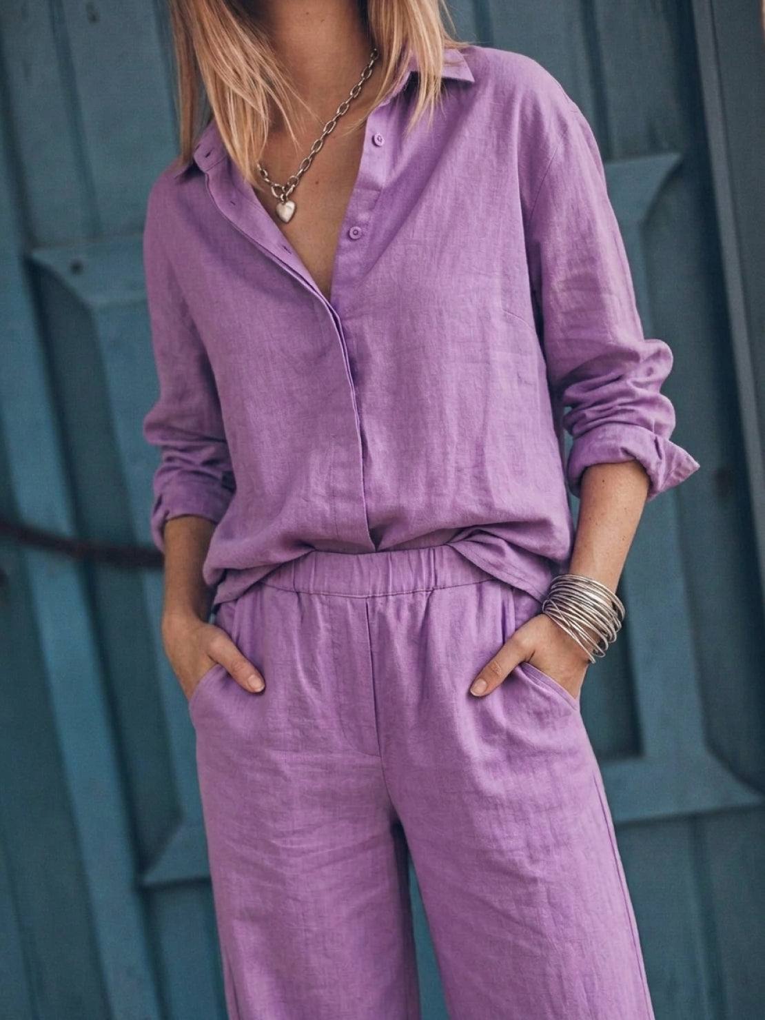 Woman wearing oversized 100% cotton shirt and wide-leg pants co-ord set in breathable fabric