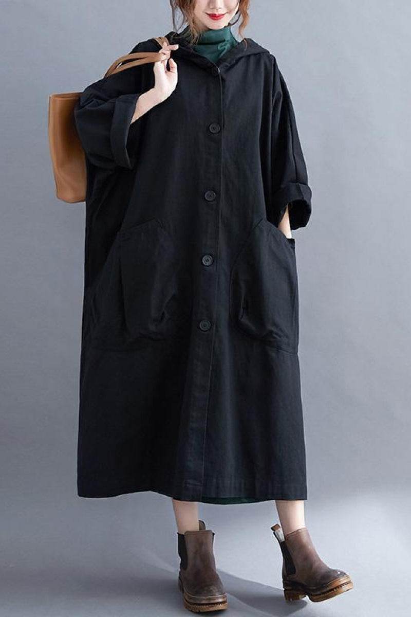 One size oversized black water resistant windbreaker jacket with hood and large front pockets, longline style for women.